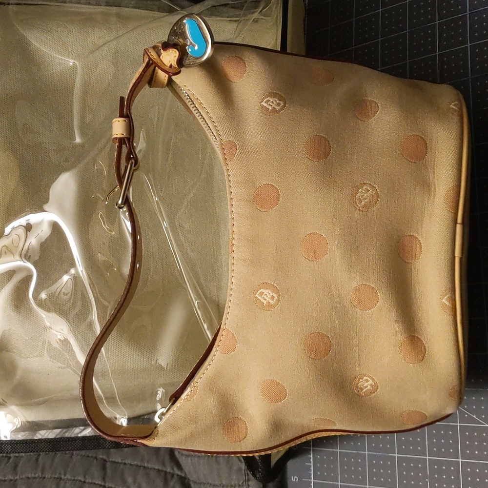 EUC Dooney & Bourke Hobo beige and (light skin tone)